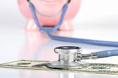 piggy bank with stethoscope2.JPG